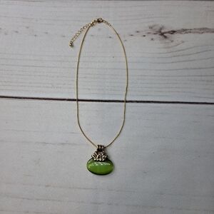 Elegant Gold Tone M Necklace with Green Pendant